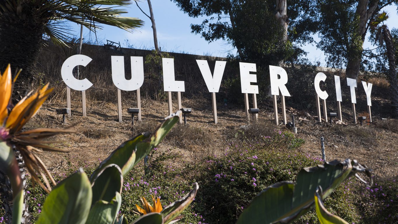 Culver City sign, surrounded by trees and plants