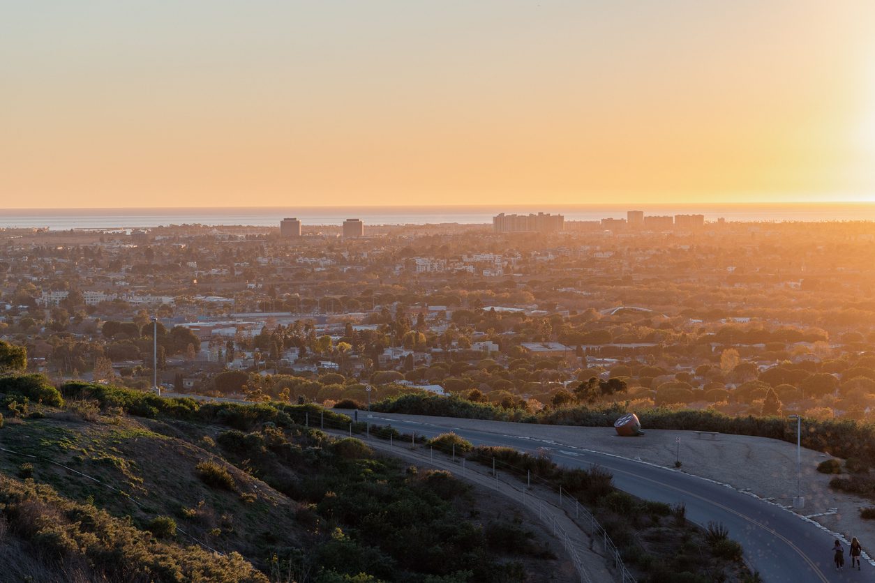 Sunset view of Pacific Ocean and city of Los Angeles from hills in Culver city