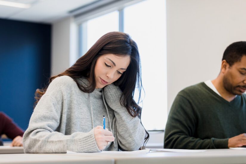 Girl writing a test