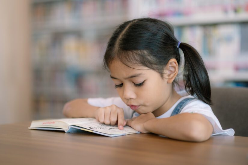 Child reading a book